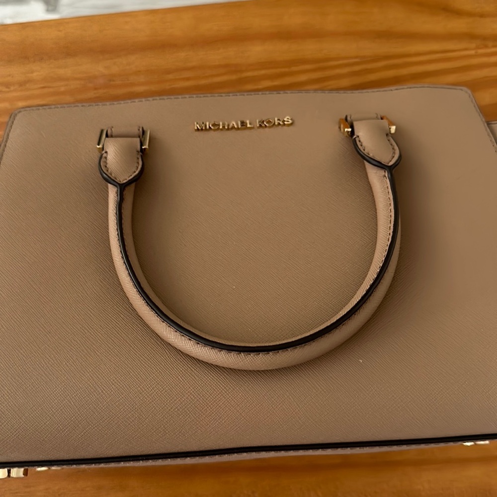 Michael Kors Purse used but in good condition,  nude color